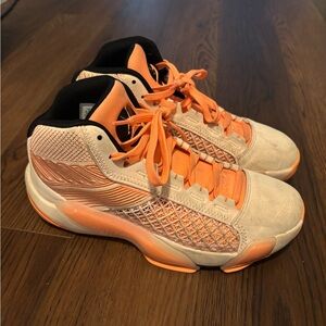 Jordan Kids Sneakers in Orange and White.